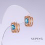 Kolczyki Xuping z niebieską cyrkonią «Topaz», długość 13 mm, grubość 7 mm, pozłacane 18K