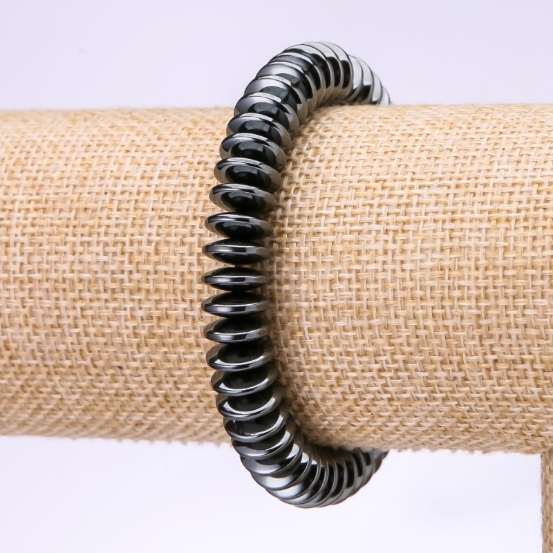 Bransoletka z hematitu — płaskie rondelki w kształcie dysków, średnica 10×3,5 mm, długość 18 cm na elastycznej gumce