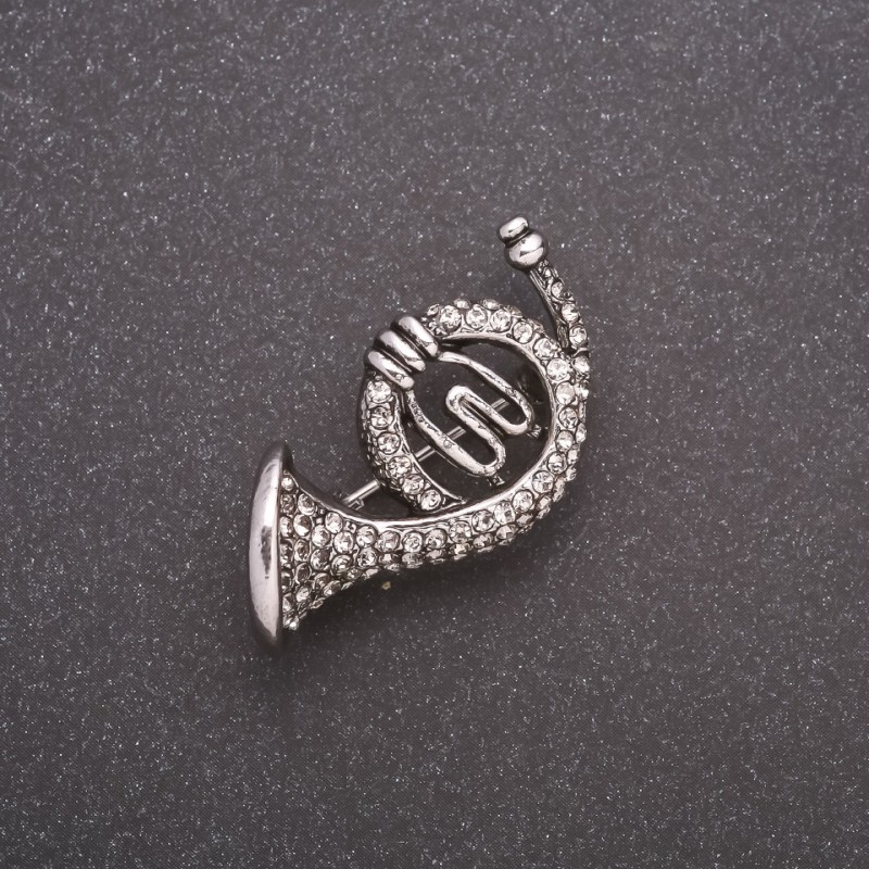 Broszka «Tuba – róg» w strassach, szary metal 35×20 mm