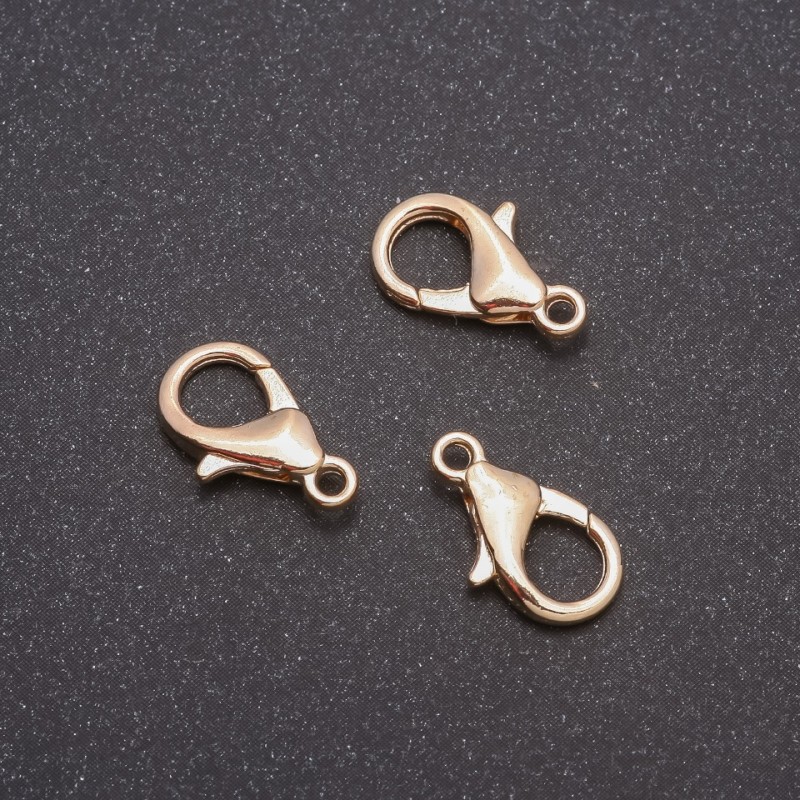 Cena za opakowanie /10 szt. Zapięcie 14×8 mm kolor metalu „jasny brąz” (1 szt.)