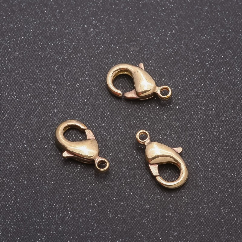 Cena za opakowanie /10 szt. Zapięcie 12×6 mm w kolorze jasny brąz