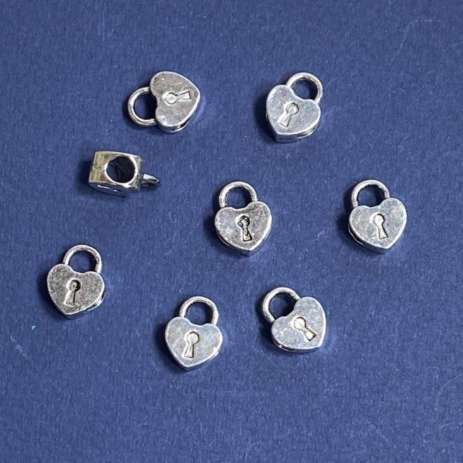 Koralik-wstawka do biżuterii, wymiary 10×13 mm, średnica wewnętrzna 4 mm, opakowanie 20 g +/- 12 szt.