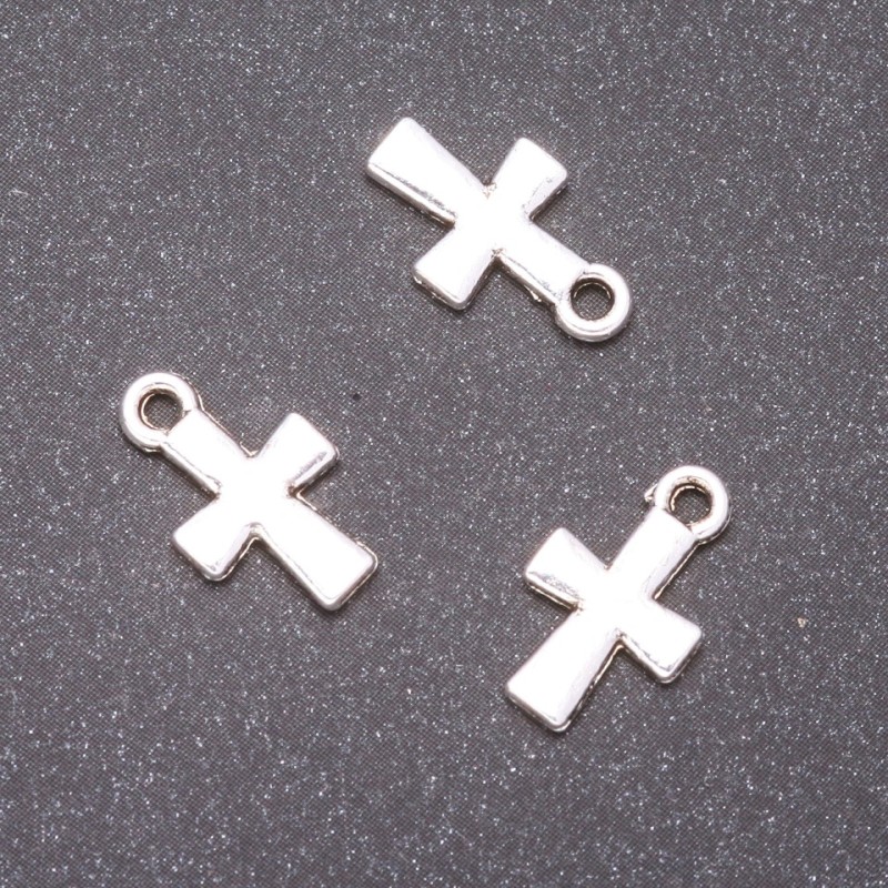Zawieszka krzyż, wymiar 14×9 mm, średnica otworu 1,5 mm, masa 20 g, +/- 41 szt.