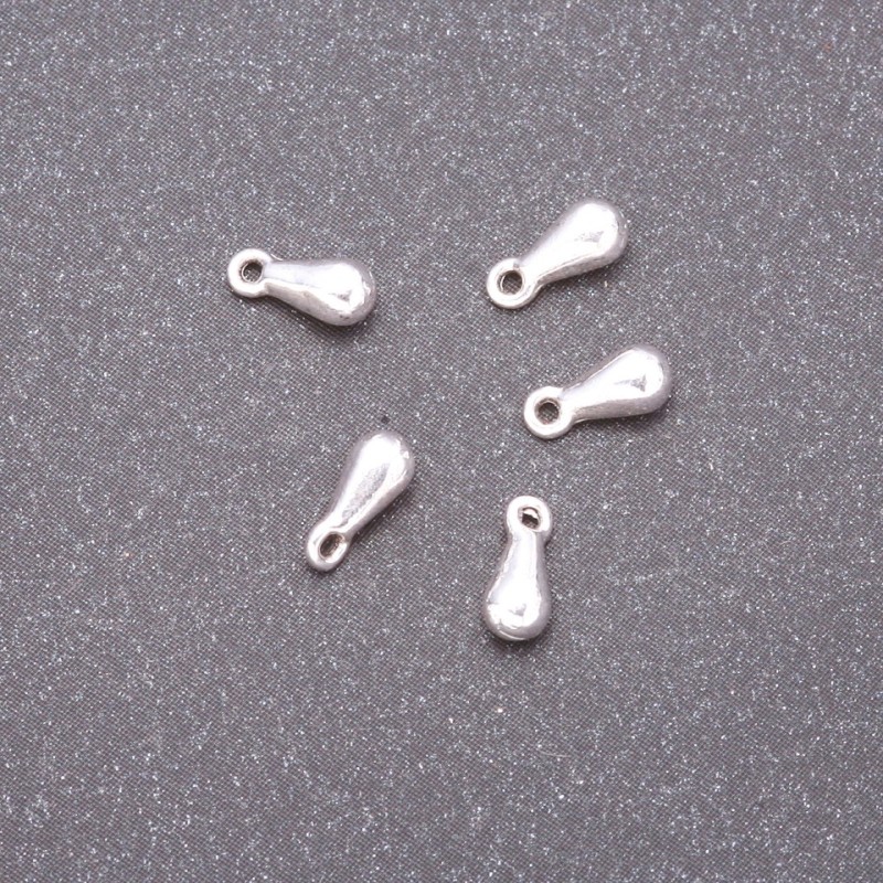 Okucia — wisiorek w kształcie kropli, średnica 7×3 mm, średnica 0,9 mm, opakowanie 20 g, ±110 szt.