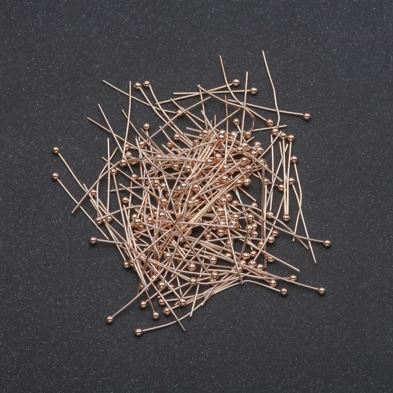 Szpilka jubilerska z kulką, żółty metal, długość 20 mm 250 g. 5000 szt.