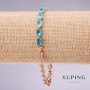 Bransoletka Xuping z błękitnymi kamieniami, grubość 5 mm, długość 17–20 cm, pozłacana, z przedłużanym łańcuszkiem