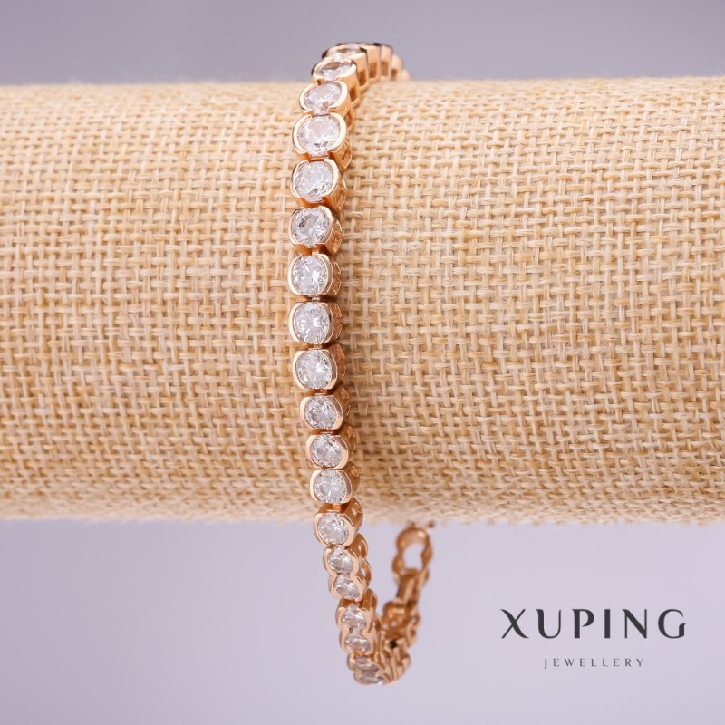Bransoletka Xuping z białymi kamieniami, grubość 7 mm, długość 17–19 cm, pozłacana z przedłużającym łańcuszkiem