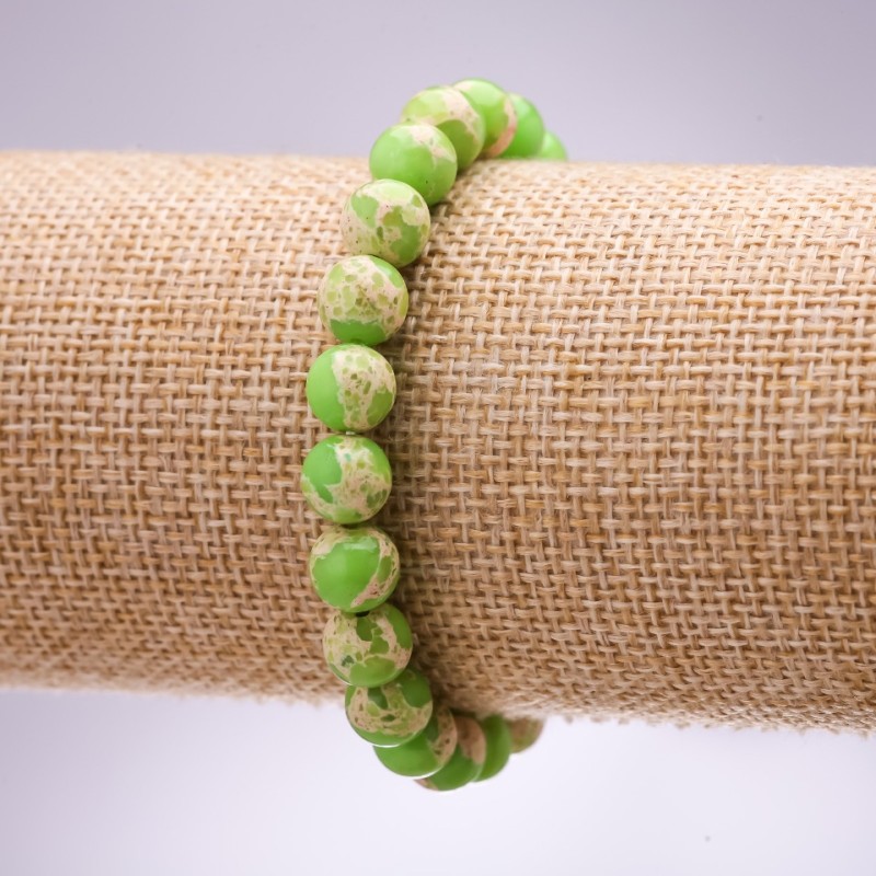 Bransoletka z varyscytu (syntetyczny) w kolorze limonkowym, gładkie kulki o średnicy 8 mm, długość 18 cm na gumce