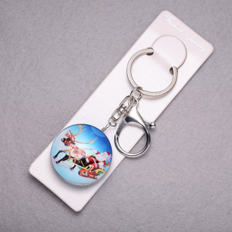 Brelok Nowy Rok Dziadek Mróz na reniferze, długość 10 cm