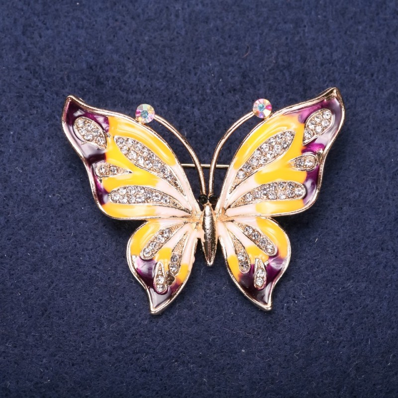 Broszka Motyl z białymi cyrkoniami, fioletową i żółtą emalią, 42×56 mm, złoty metal