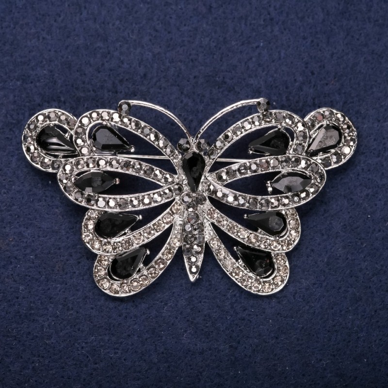 Broszka «Motyl» z czarnymi kryształami, metal srebrzysty, 39×67 mm