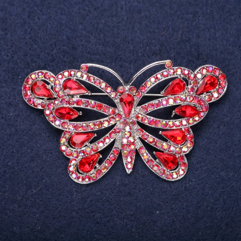Broszka Motyl z czerwonymi kryształami, 39×67 mm, metal srebrzysty