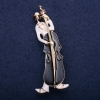 Wyprzedaż! Broszka Muzykant biała i czarna emalia 67×26 mm żółty metal