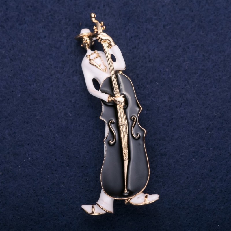 Broszka «Muzykant» – biała i czarna emalia, 67×26 mm, żółty metal