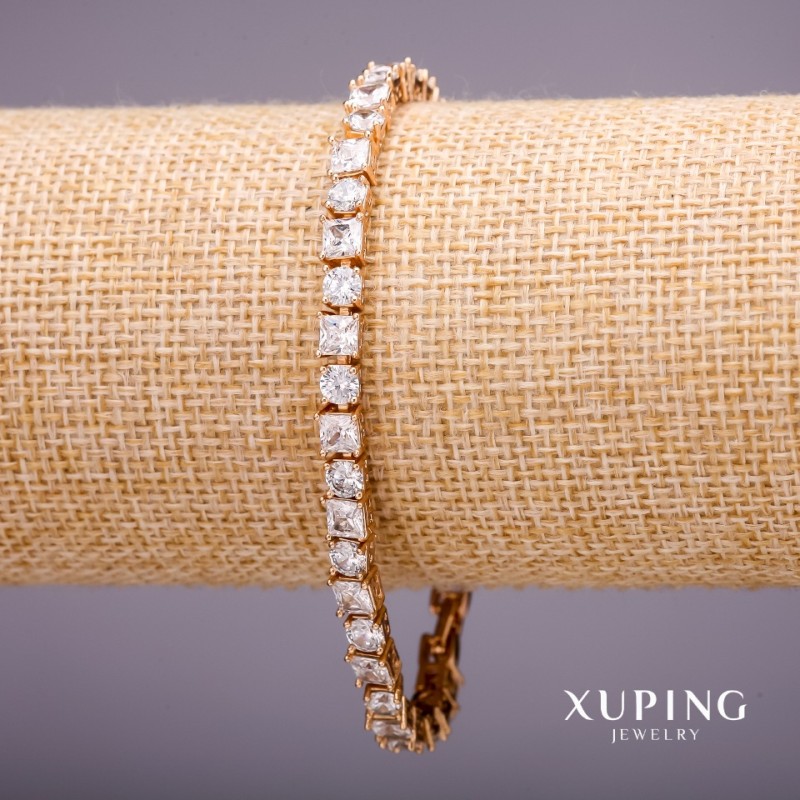 Bransoletka Xuping z kamieniami, kolor biały, grubość 5 mm, długość 17–19 cm, pozłacana