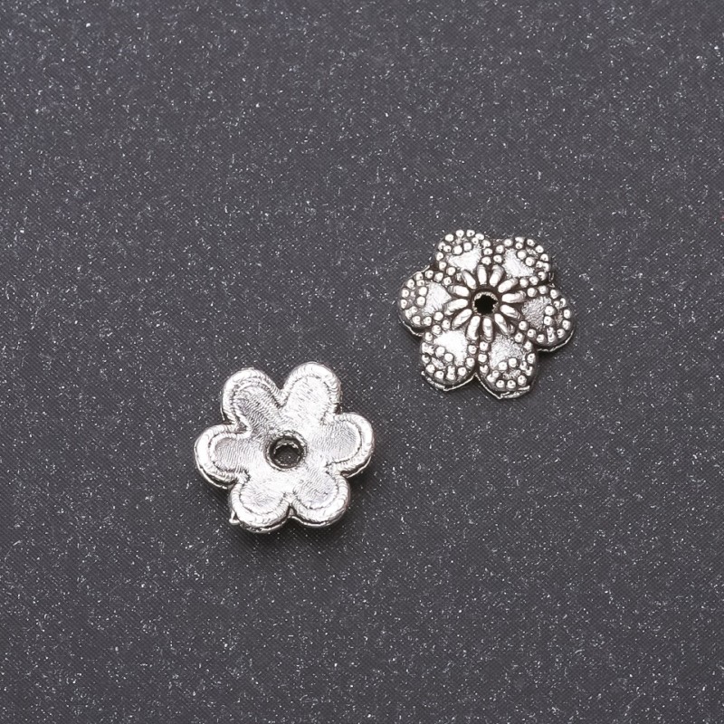 Końcówka kapeluszkowa do koralików 9 mm, wewn. średnica 1,8 mm, opakowanie 20 g (48 szt. +/-). Kolor srebrzysty metal