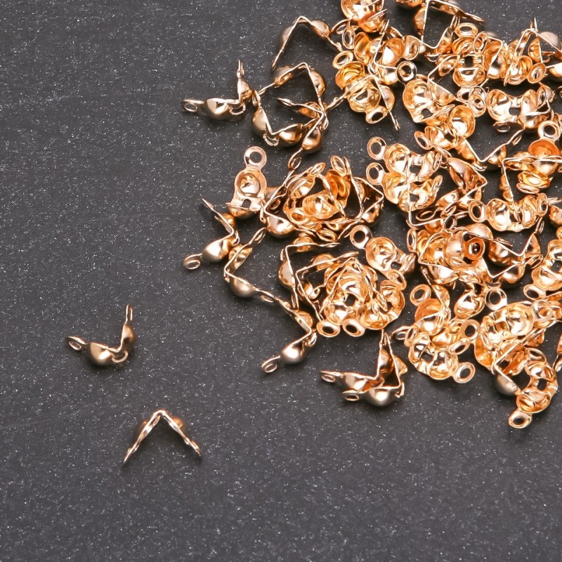 Żabka do koralików z metalu złocistego 7×4 mm (+/-) masa 10 g (+/-), 140 sztuk