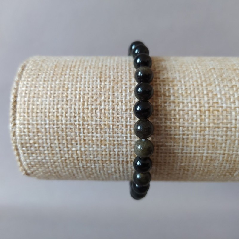 Bransoletka z złocistego obsydianu na elastycznej gumce, gładka kulka, średnica 6,5 mm, długość 18 cm