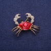 Wyprzedaż! Broszka Krab – czerwona emalia i cyrkonie, złoty metal 30×40 mm