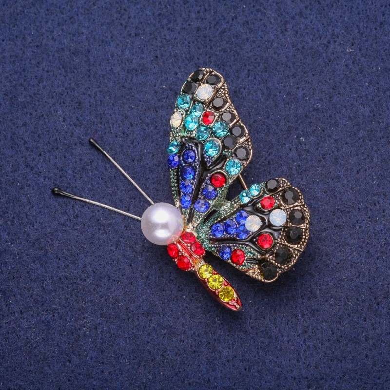 Broszka Motyl z cyrkoniami i koralikiem, żółty metal 32×41 mm
