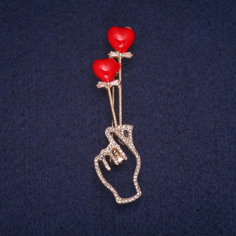 Broszka Symbol Zakochania, czerwona emalia z białymi kryształami, metal pozłacany 16×62 mm