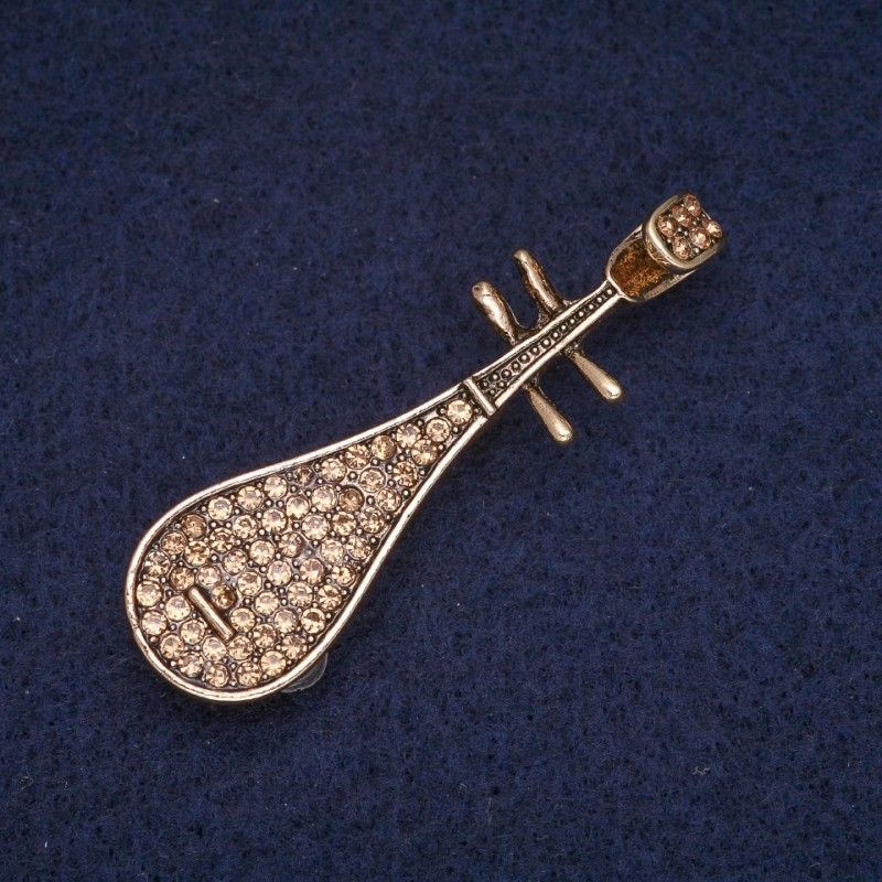 Broszka Pipa z żółtymi kryształami, metal złocony 15×50 mm