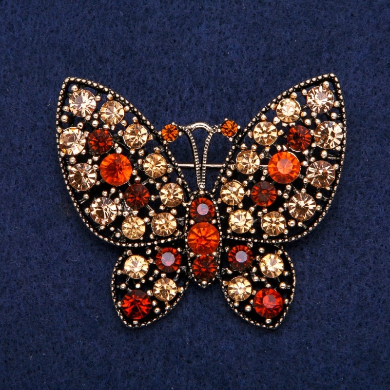 Broszka Motyl z żółtymi kryształami, metal złocisty 48×56 mm