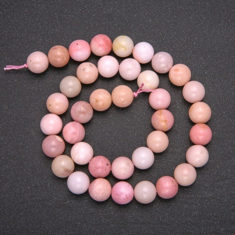 Koraliki z naturalnego kamienia – różowy opal, gładkie kuleczki, średnica 8 mm (+/-), długość 38 cm