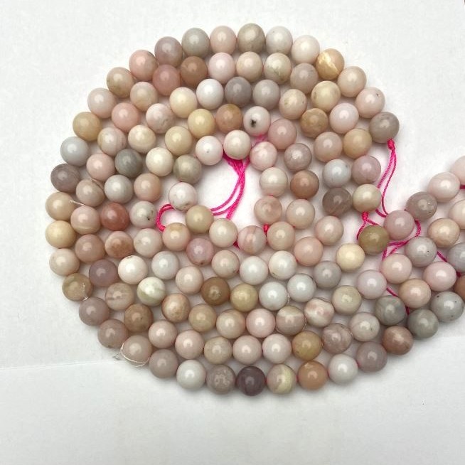 Koraliki z naturalnego kamienia – różowy opal, gładka kuleczka, średnica 10 mm (+/-), długość 38 cm