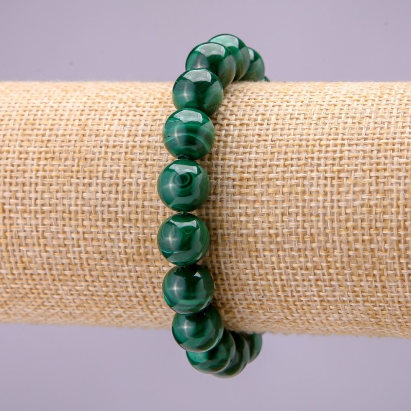 Bransoletka z naturalnego kamienia malachitu – gładkie kuleczki, średnica około 10 mm, na elastycznej gumce, długość 18 cm