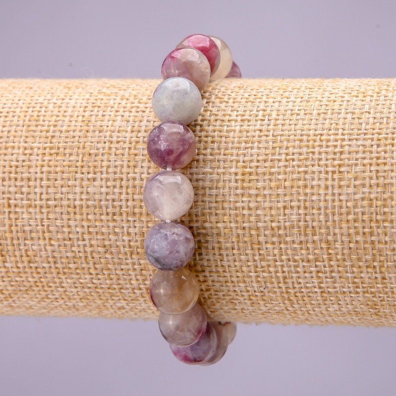 Bransoletka z naturalnego kamienia, różowy turmalin — gładka kulka, średnica około 10 mm, na elastycznej gumce, długość 18 cm