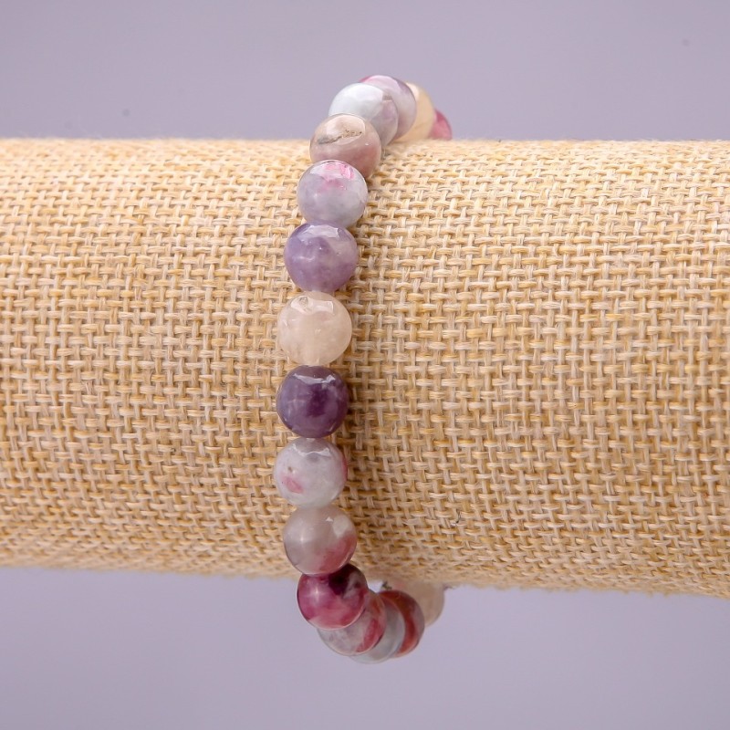 Bransoletka z naturalnego kamienia - różowy turmalin, gładka kulka, średnica około 8 mm, na elastycznej gumce, długość 18 cm