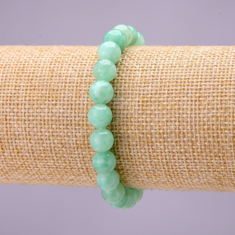 Bransoletka z naturalnego kamienia birmański jadeit, gładka kulka, średnica ok. 8 mm, na gumce, długość 18 cm