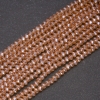 Koraliki z czeskiego kryształu, kolor szampański z napylaniem benzynowym 'rondele', średnica 3,5×3 mm, na nitce, długość 38 cm