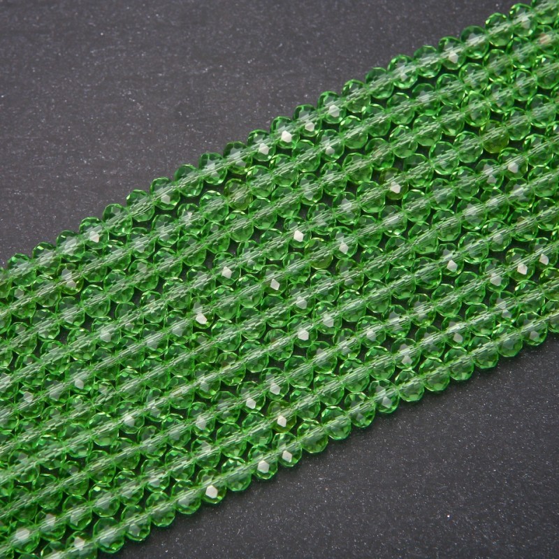 Koraliki czeskiego kryształu, przejrzyste w zieleni sałatkowej „rondele”, średnica 6x4,5 mm, na nić o długości około 38 cm