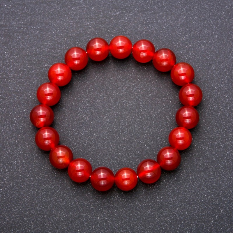Bransoletka z karneolu – gładkie kuleczki, średnica 10 mm, obwód 18 cm