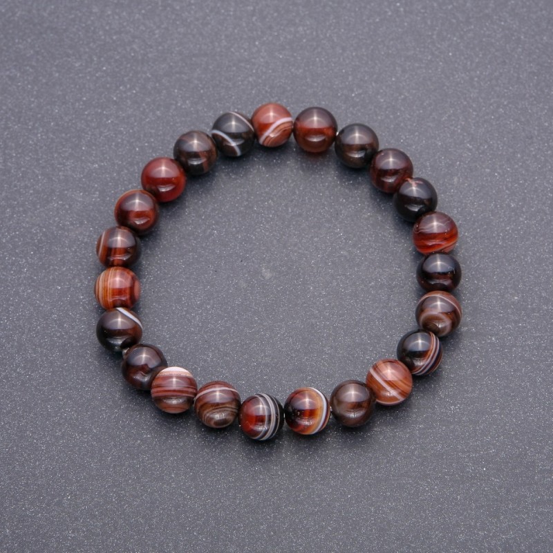 Bransoletka z agatu, gładkie kuleczki, średnica około 8 mm, obwód 18 cm, na elastycznej gumce