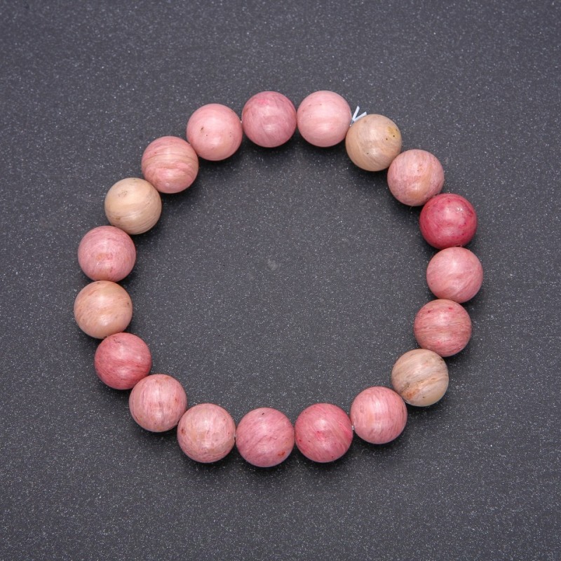 Bransoleta z naturalnego rodonitu, gładka kulka, średnica 10 mm (±), długość 18 cm na elastycznej gumce