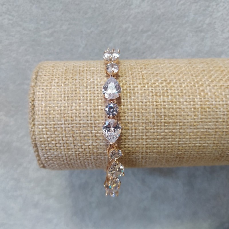 Bransoletka Xuping z białymi kamieniami, grubość 7 mm, długość 17–19 cm, pozłacanie 18K z dodatkowym ogniwem