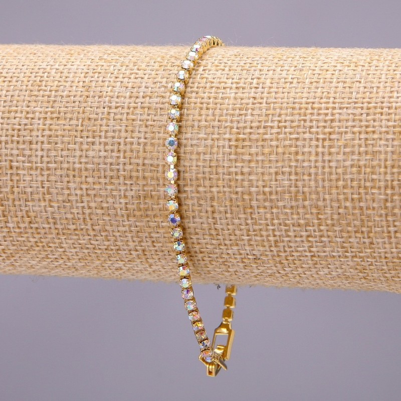 Bransoletka z cyrkoniami na zapięciu, jednorzędowa, kolor metalu złoty, długość 20 cm, szerokość 3 mm