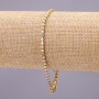 Bransoletka z cyrkoniami na zapięciu, jednorzędowa, kolor metalu złoty, długość 20 cm, szerokość 3 mm