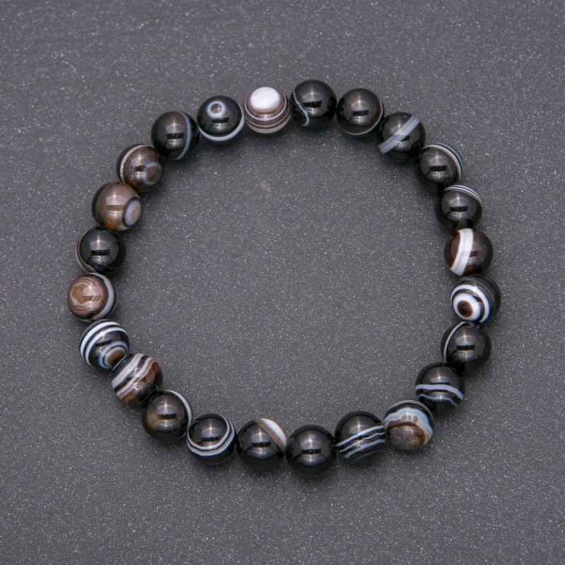 Bransoletka z naturalnego agatu — gładka kuleczka, średnica ok. 8 mm, obwód 18 cm, na gumce