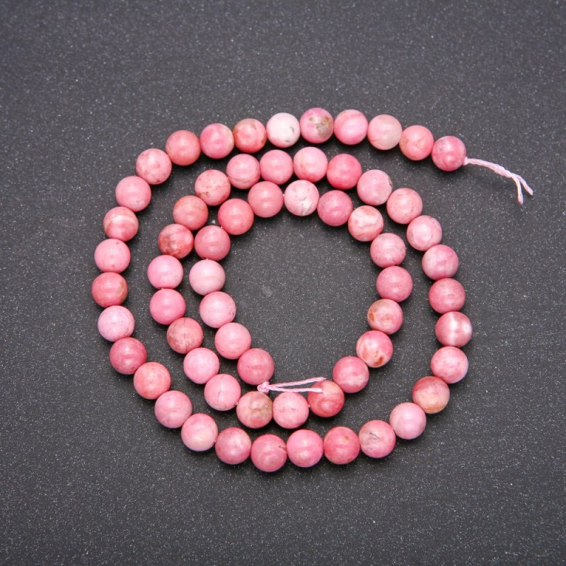 Koraliki z naturalnego kamienia rodokrozyt — gładkie kuleczki, średnica około 6 mm (+/-), długość 38 cm
