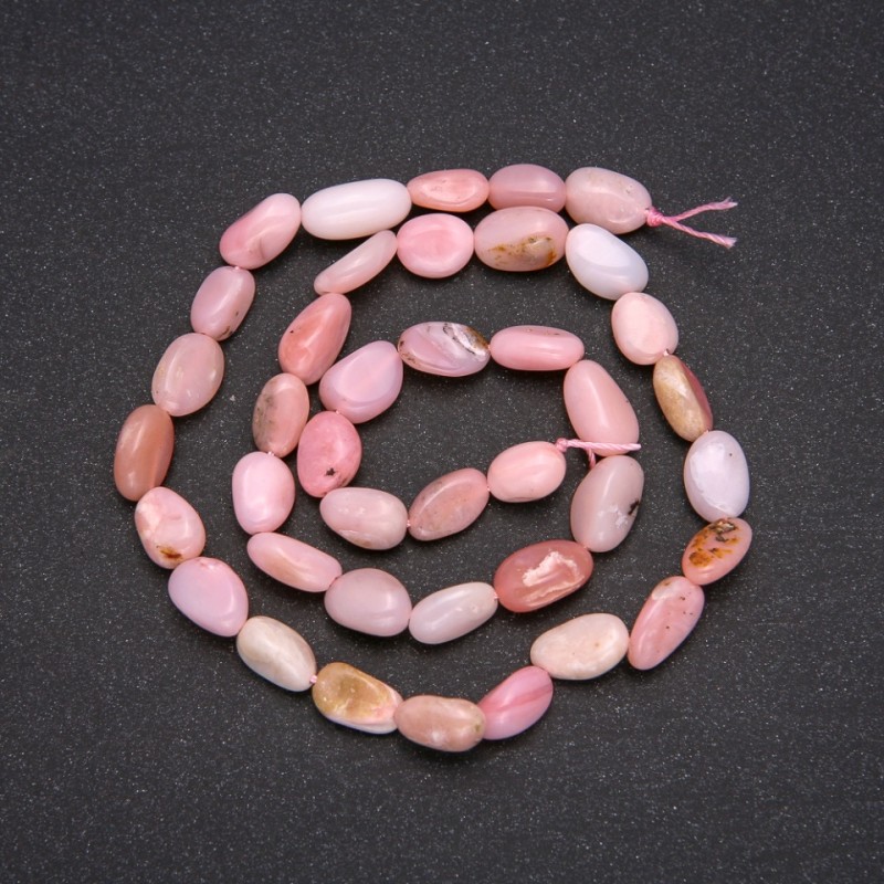 Koraliki z naturalnego kamienia – opal różowy, fasetowane, średnica 7x12 mm (+/-), długość 38 cm
