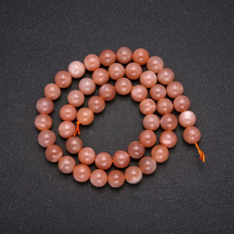Koraliki z naturalnego selenitu w gładkich kuleczkach, średnica 8 mm (+/-), długość 38 cm