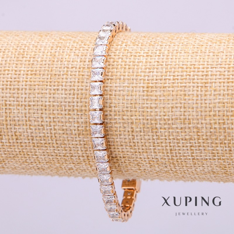 Bransoletka Xuping z białymi kamieniami, grubość 5 mm, długość 18 cm, pozłacana