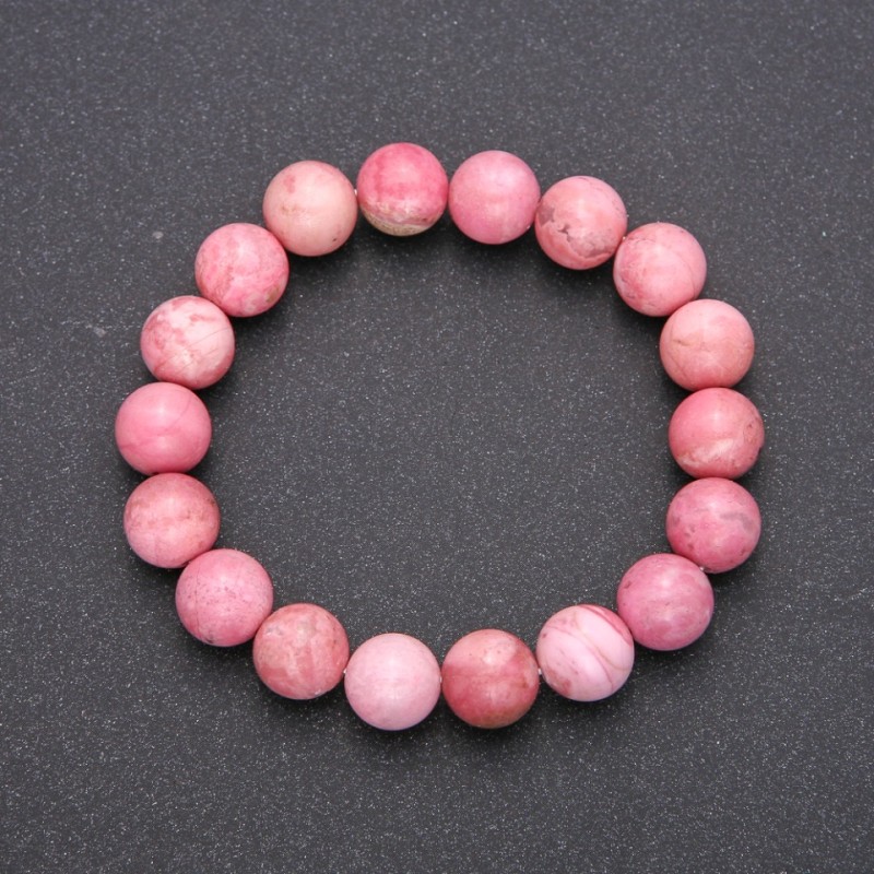 Bransoletka z naturalnego rodokrozytu na gumce, gładka kuleczka, średnica około 8 mm, długość 18 cm