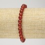 Bransoletka z karneolu na elastycznej gumce, gładkie kuleczki, średnica 6 mm, obwód 18 cm
