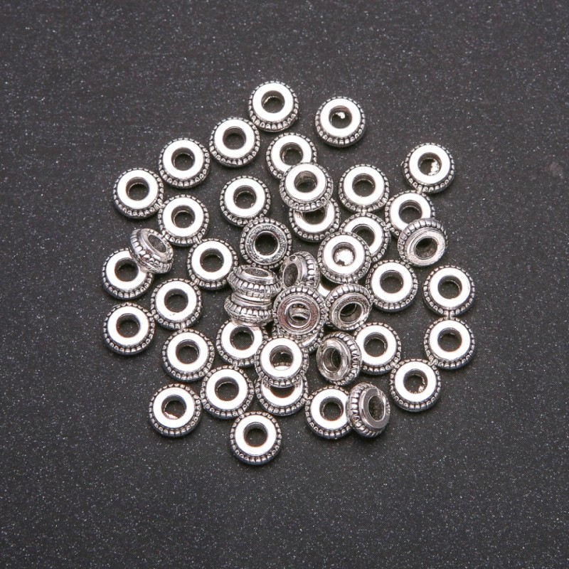 Okucia – koralik-wstawka, kolor metalu: srebrny, średnica 3×7 mm, opakowanie 20 g, 45 szt. (+/-)