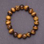 Bransoletka z naturalnego kamienia – tygrysie oko na elastycznej gumce, średnica 10 mm, obwód 18 cm